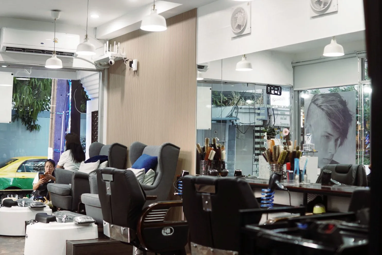 Barber chairs, styling stations and pedicure chairs inside Metamorphosis